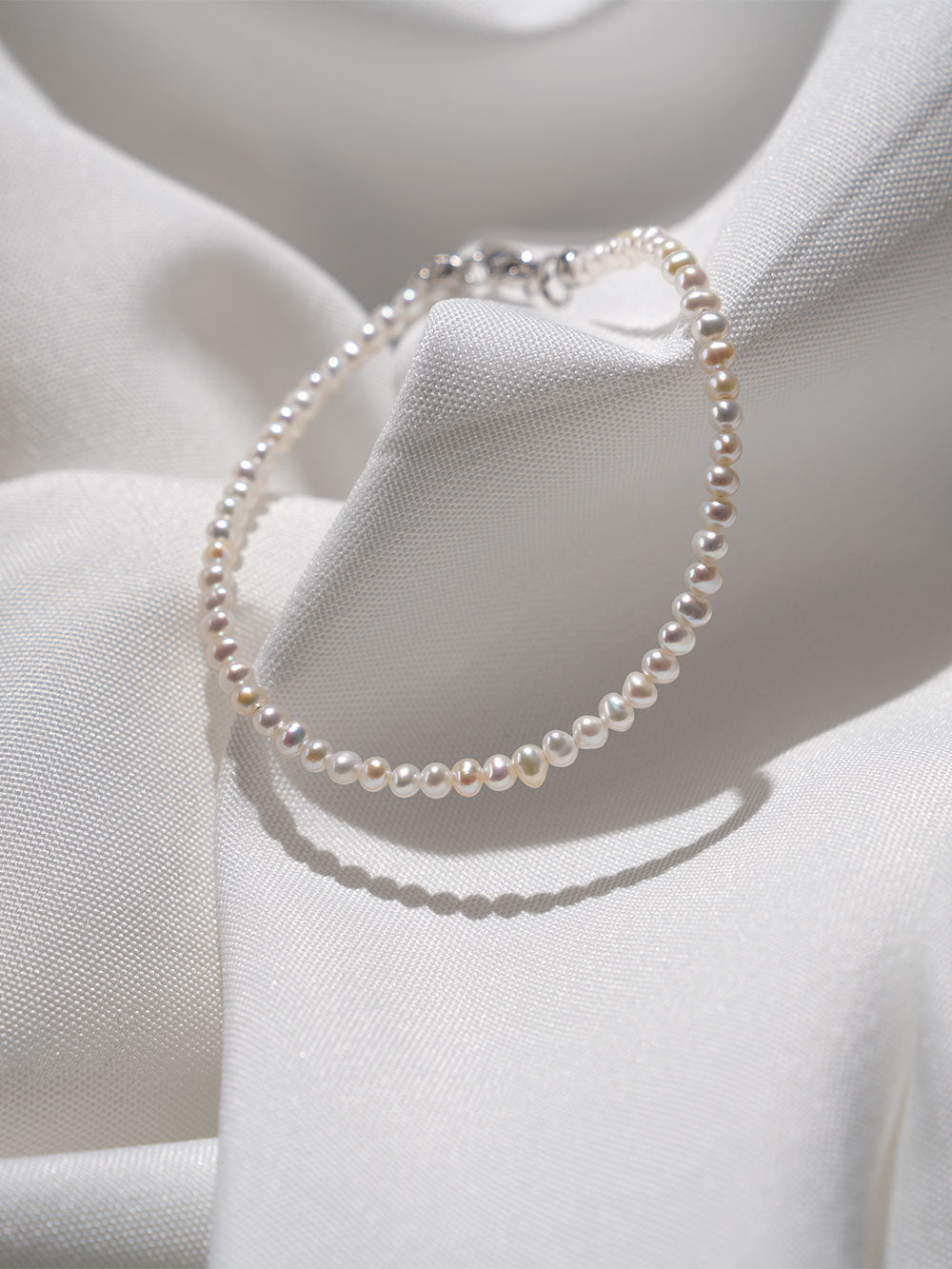 Pulsera de perlas cultivadas de agua dulce pequeñas de 3-4 mm redondas