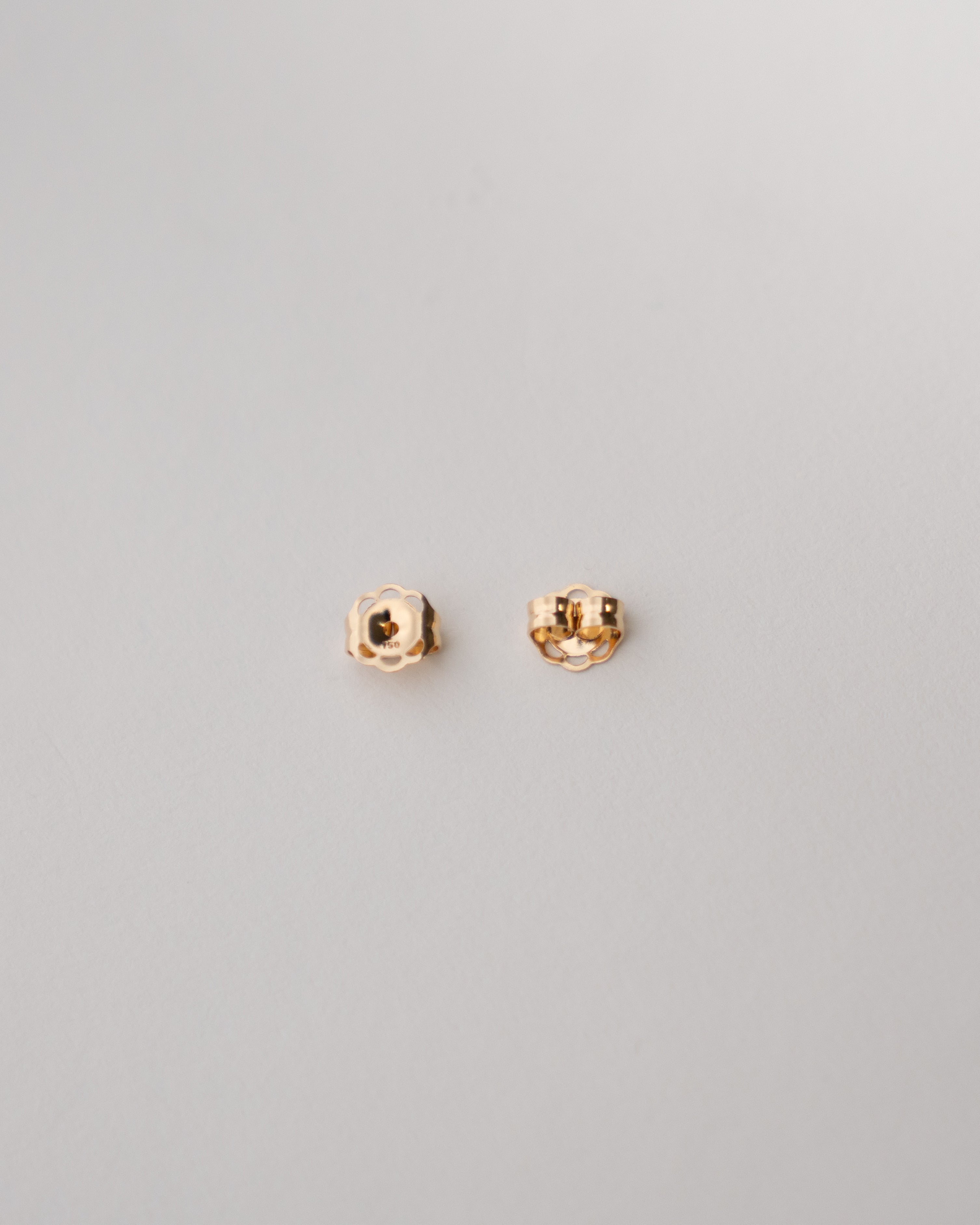 Tuercas de presión en Oro 18K