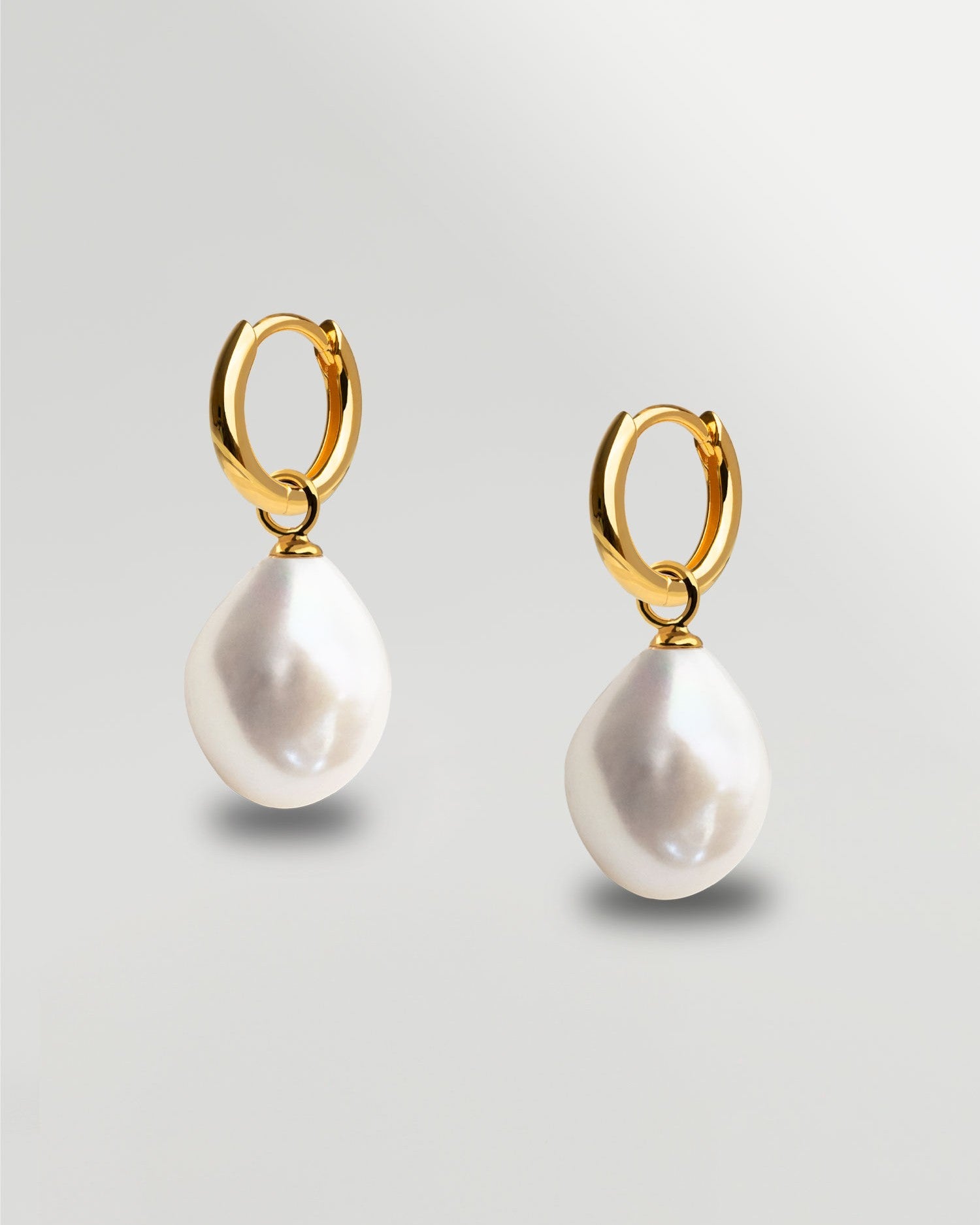 Aros de oro 18k con perla barroca secret & you