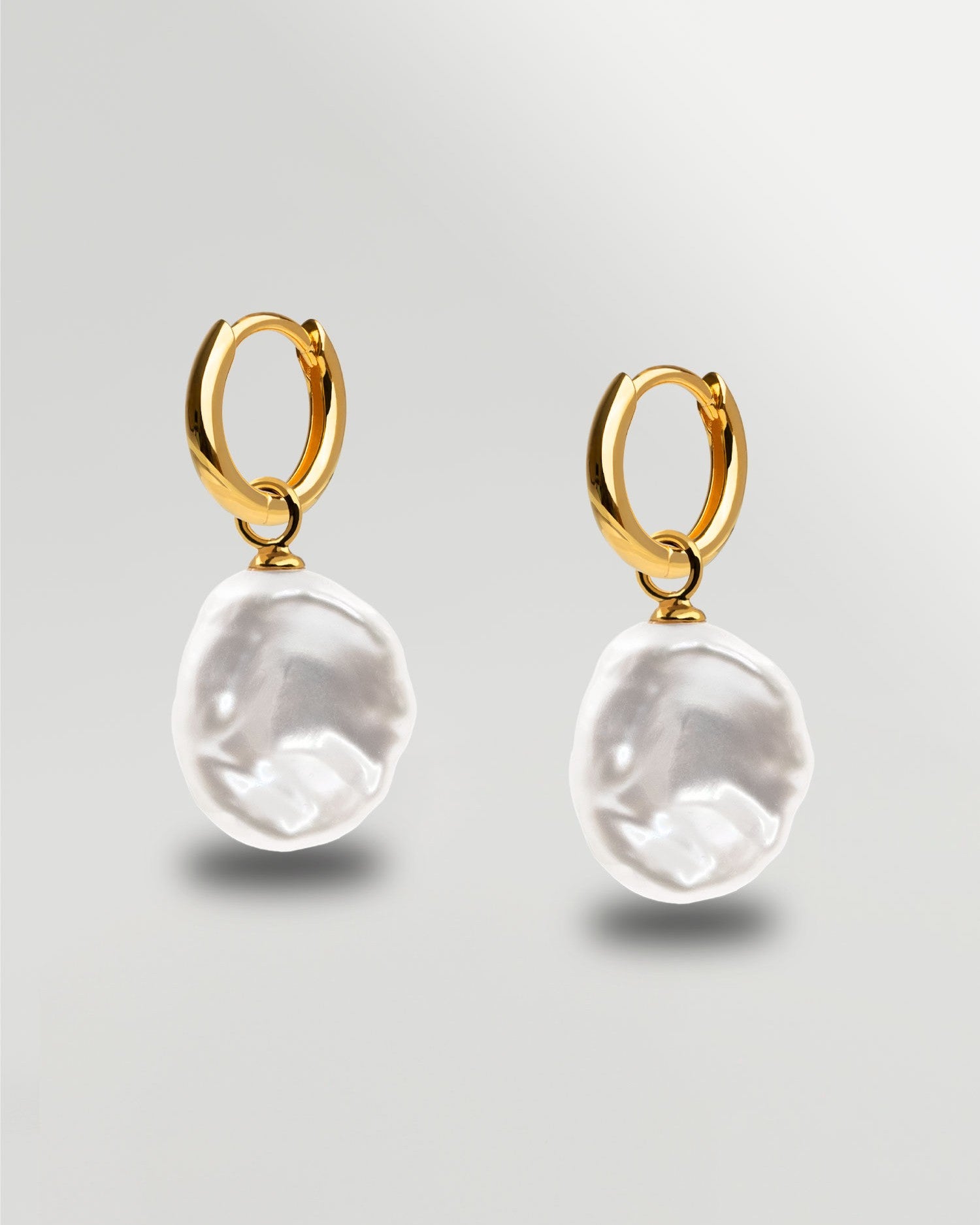 Aros de oro 18k con perla keshi