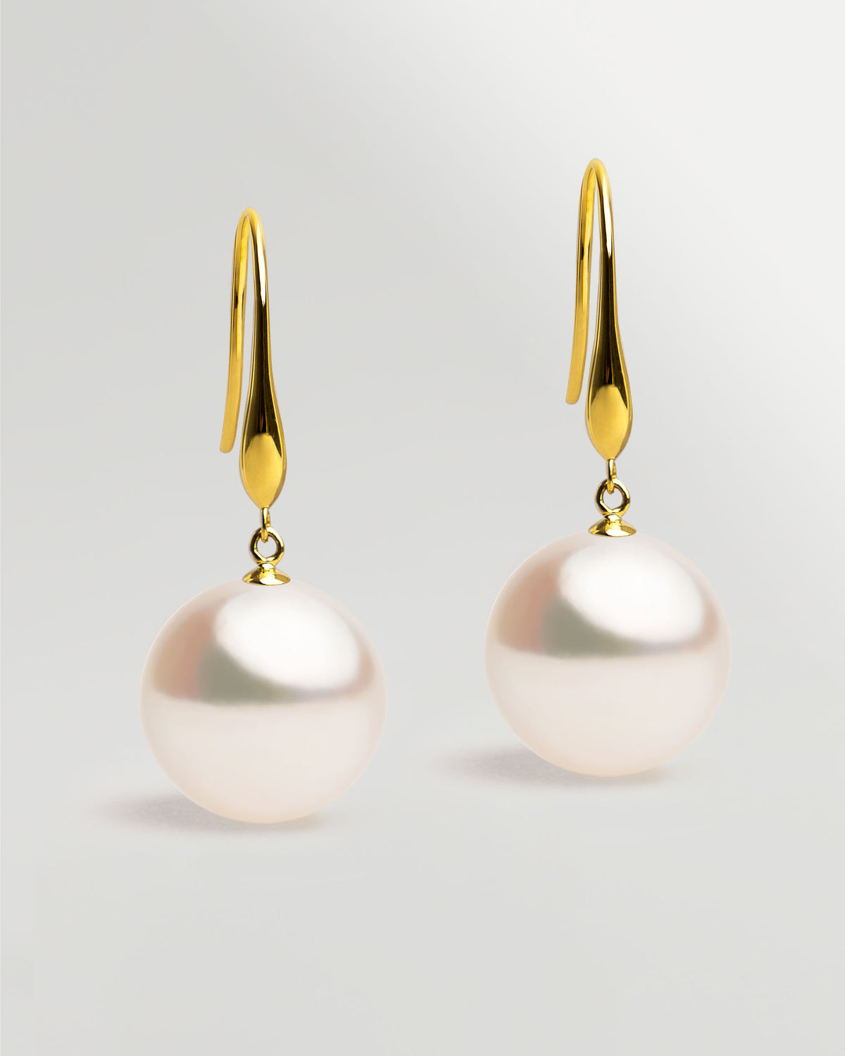 Pendientes Gancho largo en oro amarillo 18k y Perla Akoya