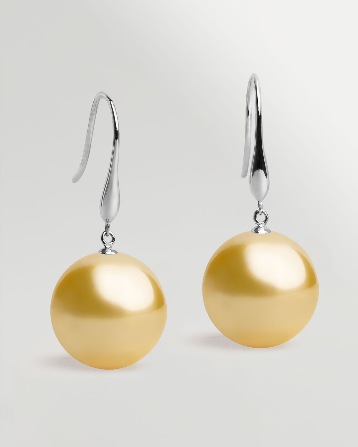 Pendientes Gancho largo en oro blanco 18k y Perla Australiana Dorada 10mm