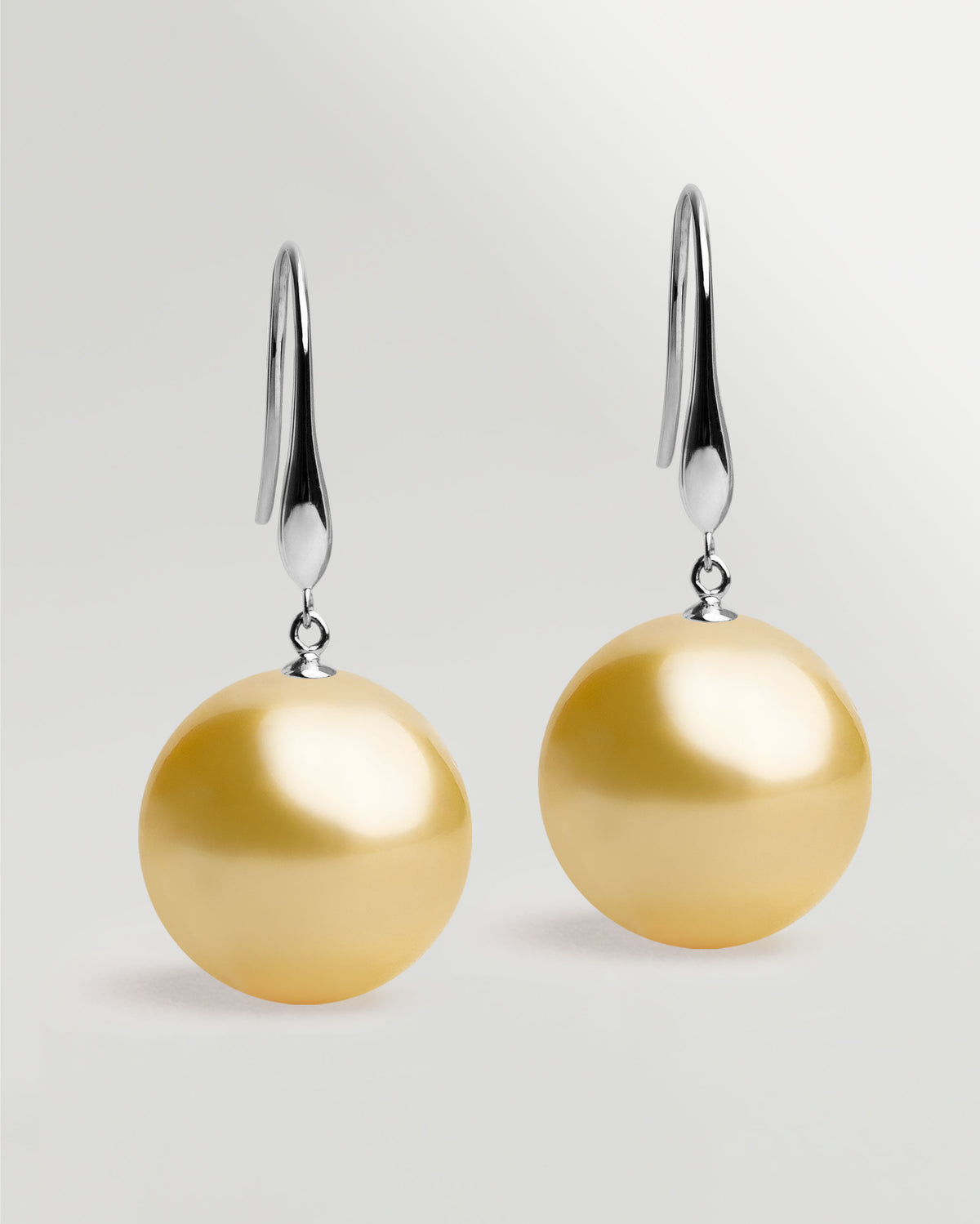Pendientes Gancho largo en oro blanco 18k y Perla Australiana Dorada 11mm