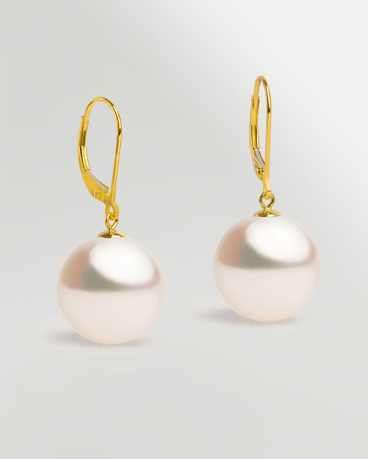 Pendientes Mosquetón en oro amarillo 18K y Perla Akoya