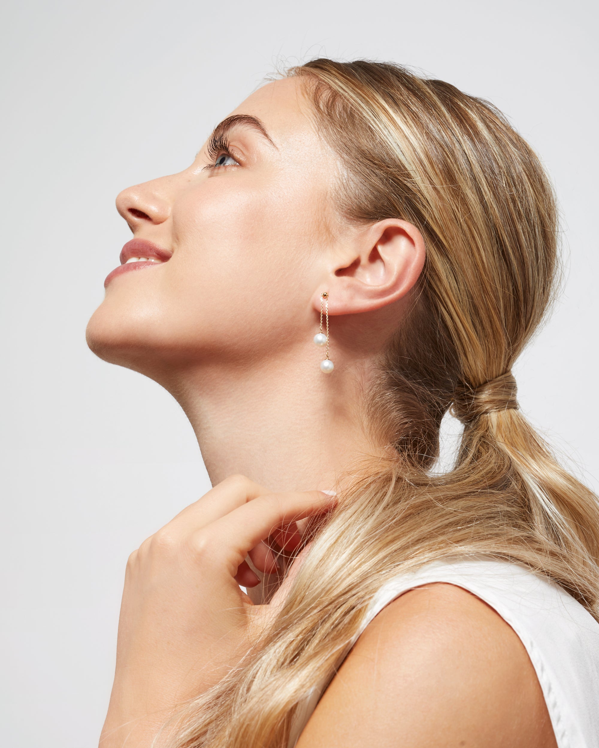Pendientes de dos perlas redonda colgante en Oro 18k