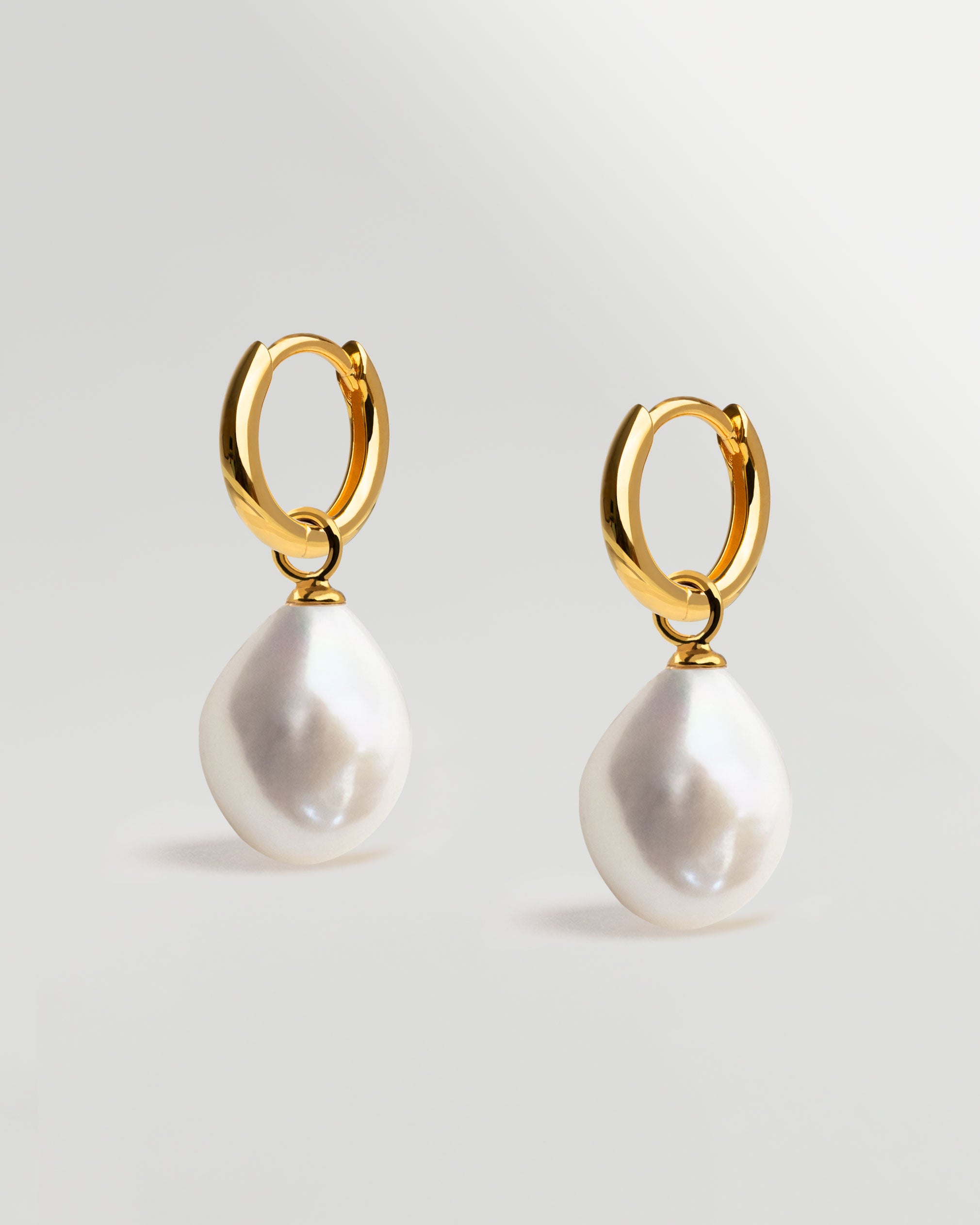 Aros de oro 18k con perla barroca secret & you