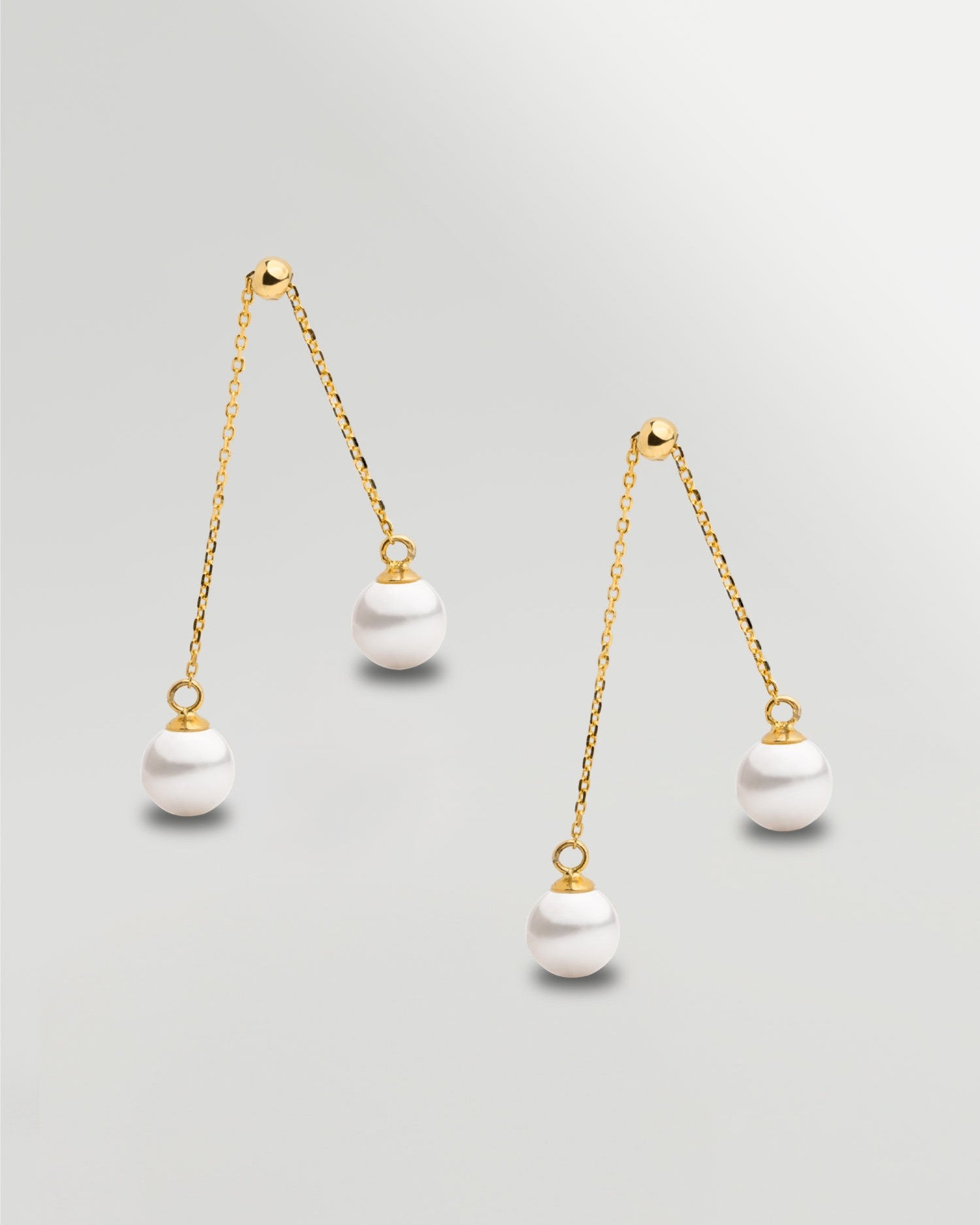 Pendientes de dos perlas redonda colgante en Oro 18k