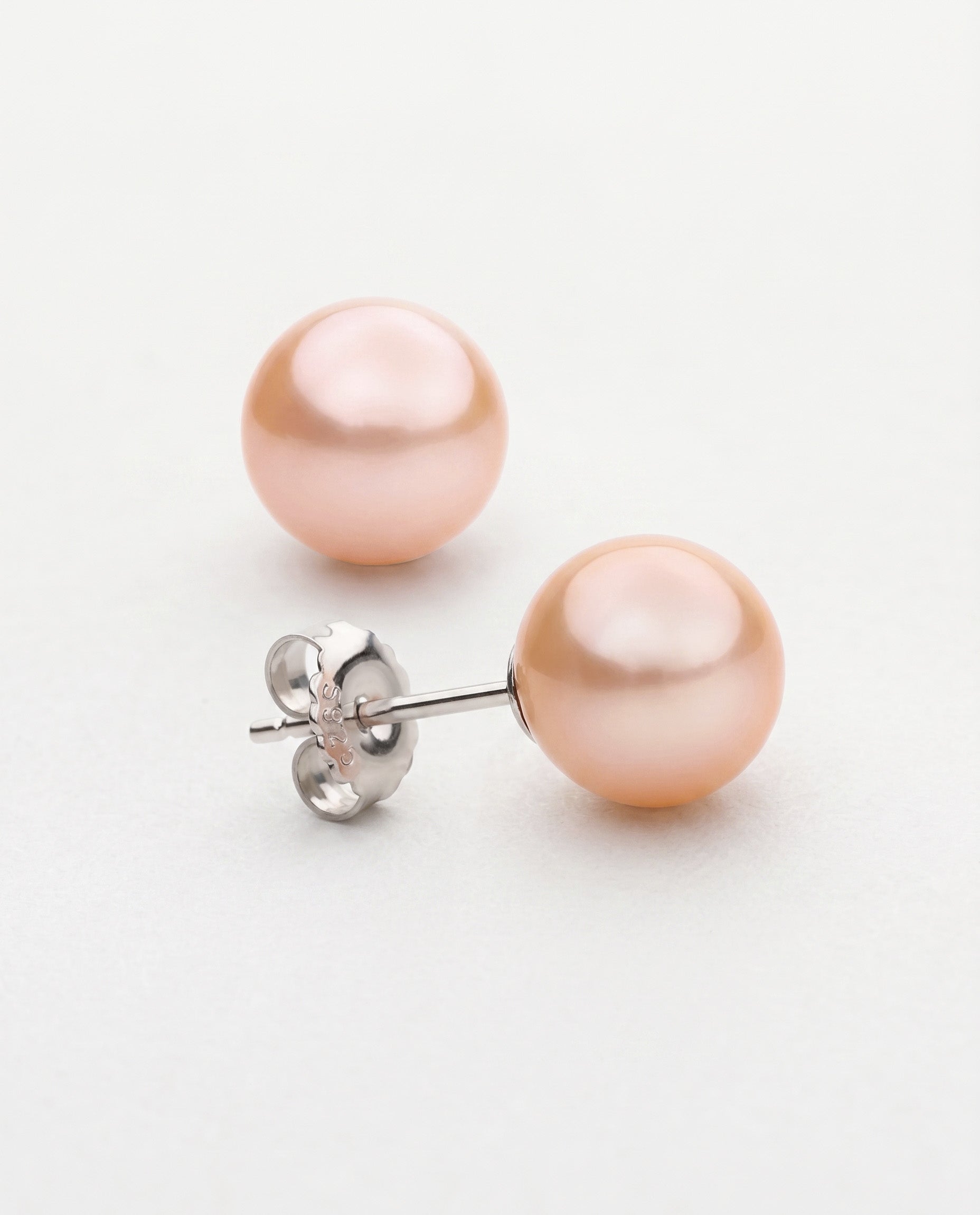Pendientes de perlas cultivadas de agua dulce de color natural melocotón - naranja