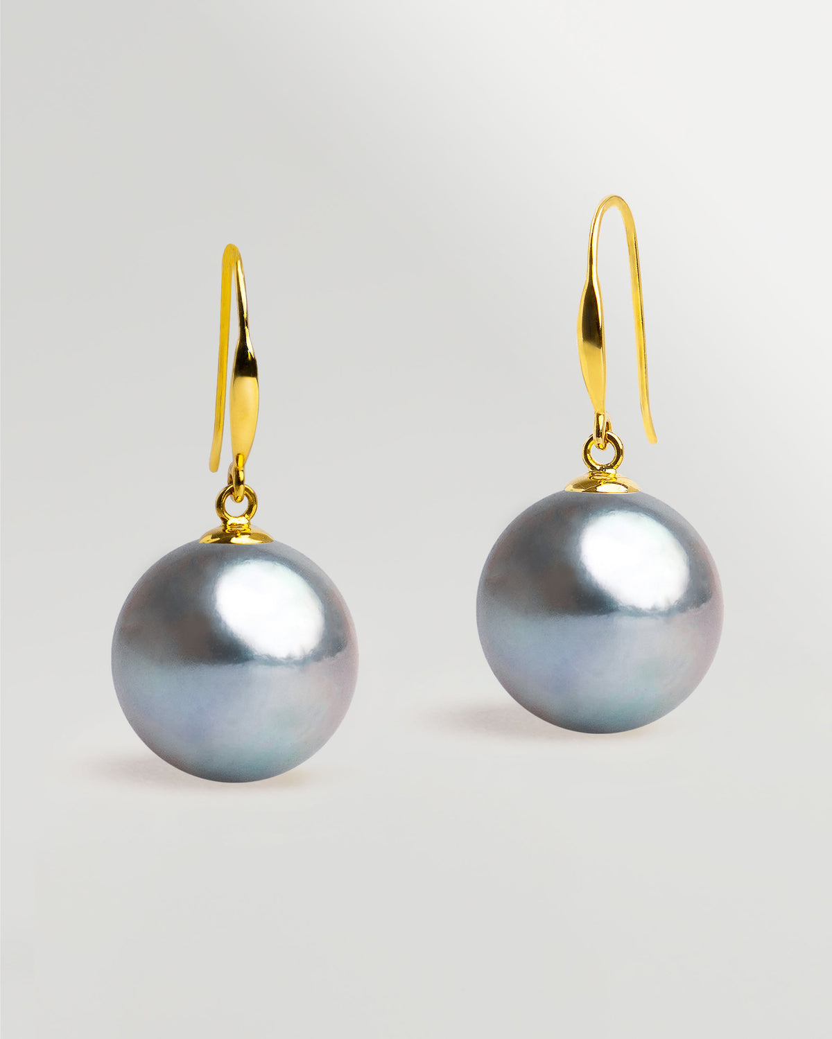 Pendientes Gancho fino en oro amarillo 18k y Perla Blue Akoya